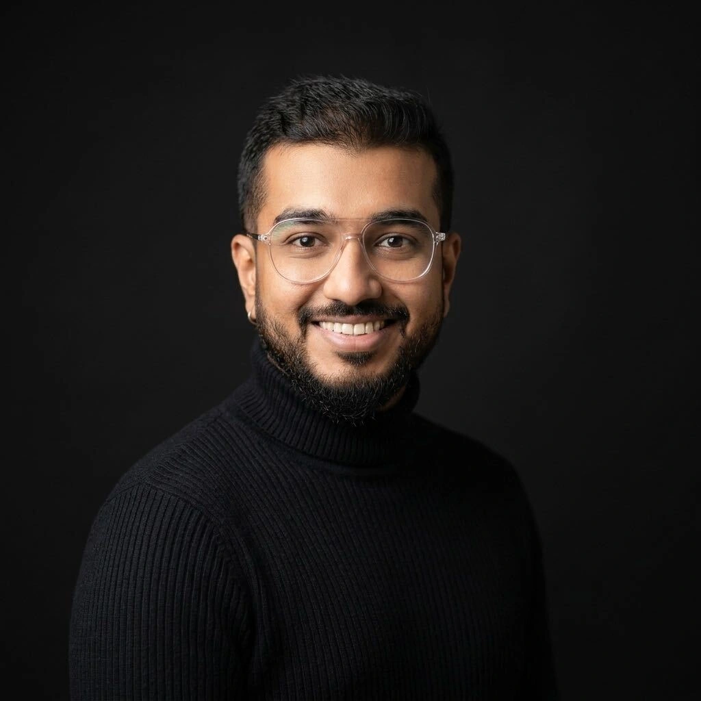 Portrait in a turtleneck against a dark background